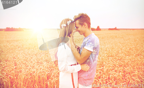 Image of happy smiling young hippie couple outdoors