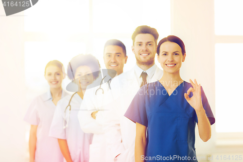 Image of group of happy doctors at hospital