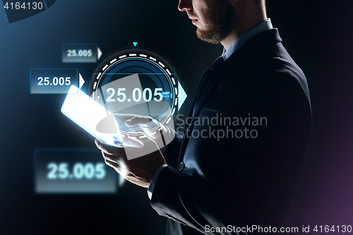 Image of close up of businessman with transparent tablet pc