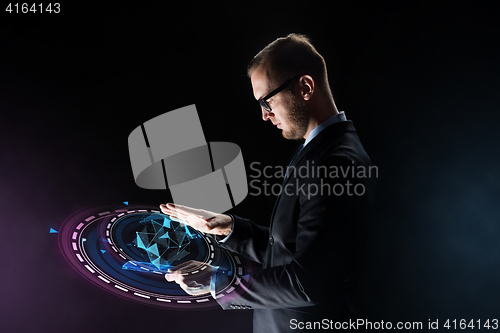 Image of businessman with tablet pc and virtual projection