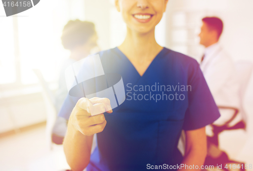 Image of close up of nurse pointing on you at hospital