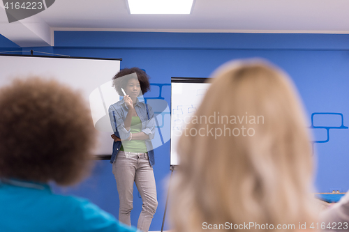 Image of Black woman Speaker Seminar Corporate Business Meeting Concept