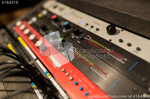 Image of music mixing console at sound recording studio