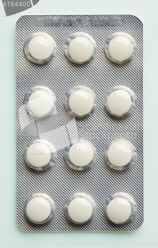 Image of blister of white pills