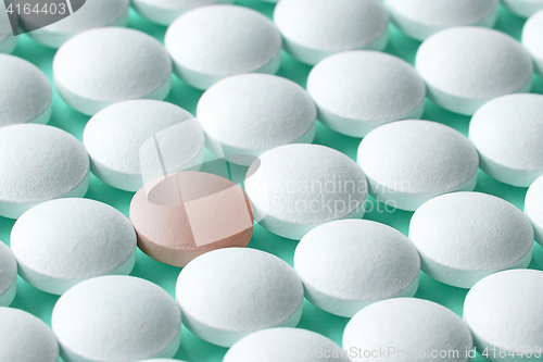 Image of white and pink pills