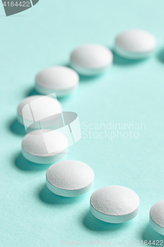 Image of white pills macro