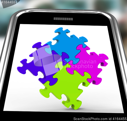 Image of Puzzle Square On Smartphone Shows Unity