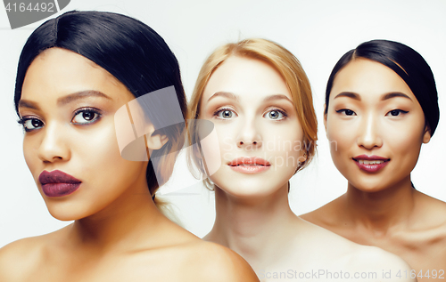 Image of three different nation woman: asian, african-american, caucasian together isolated on white background happy smiling, diverse type on skin, lifestyle people concept 