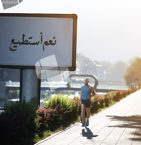 Image of Elderly man jogging