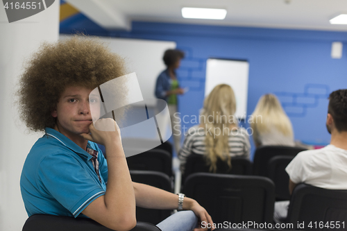 Image of Portrait of young informal businessman