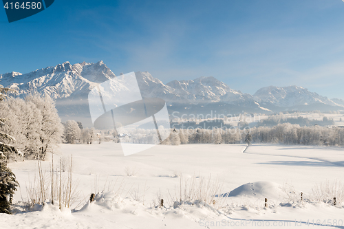 Image of Austrian Winter Wonderland with mountains, fresh snow and haze