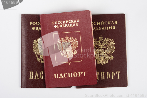 Image of Three passport of the citizen of the Russian Federation on a white background