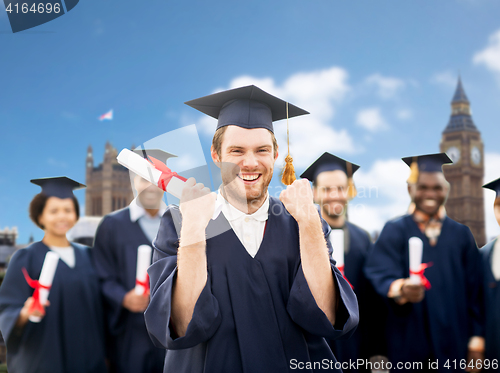 Image of happy student with diploma celebrating graduation