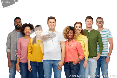 Image of international group of people pointing on you