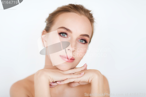 Image of beautiful young woman face and hands