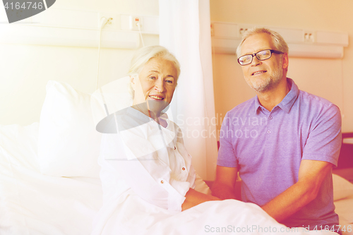 Image of senior couple meeting at hospital ward