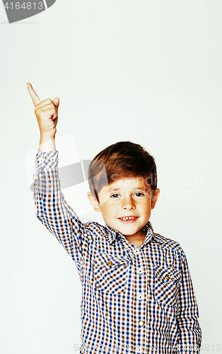 Image of young pretty little cute boy kid wondering, posing emotional fac