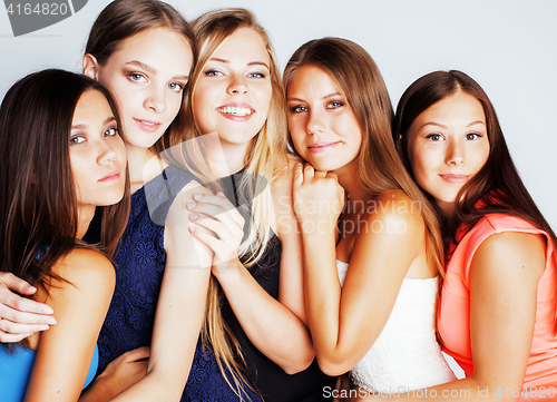 Image of many girlfriends hugging celebration on white background, smilin