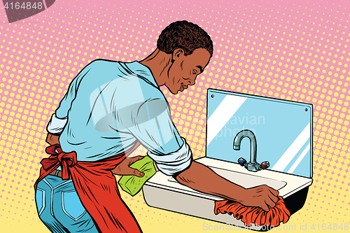 Image of Home cleaning washing kitchen sinks, man works