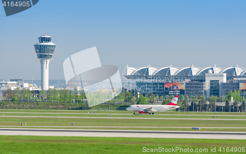 Image of Munich international airport view with passenger airplane of Aus