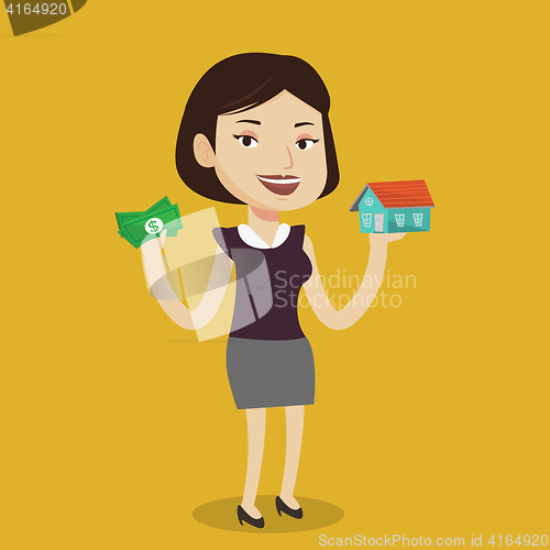 Image of Woman buying house thanks to loan.