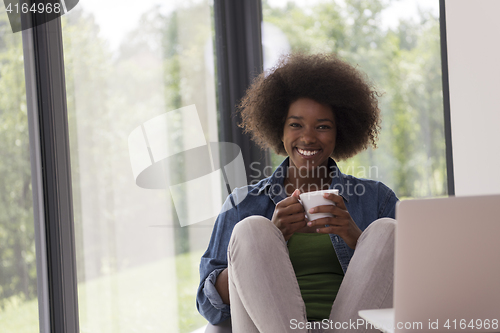 Image of African American woman in the living room