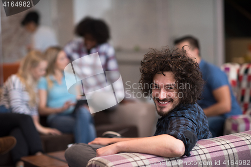 Image of Portrait of young informal businessman