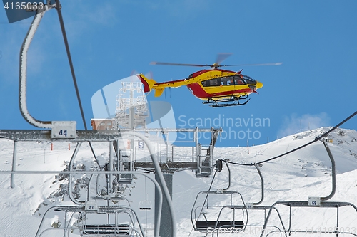 Image of Rescue helicopter in the mountains