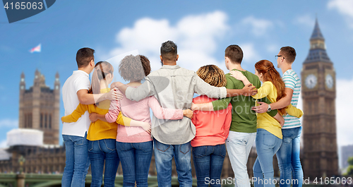 Image of international group of people hugging over london