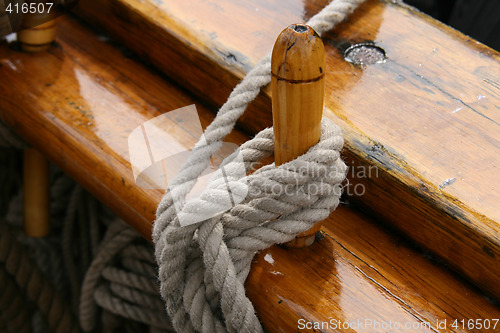 Image of rope fasten on a ship.