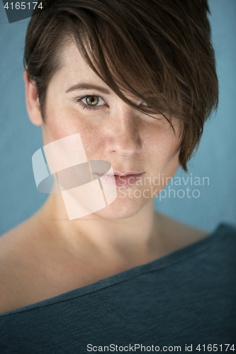 Image of Indoor portrait of a natural woman