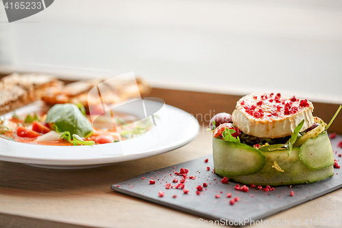 Image of goat cheese salad and gazpacho soup at restaurant