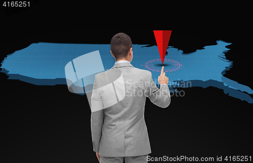 Image of businessman with virtual usa map and pointer