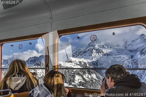 Image of Tourists in Mountains