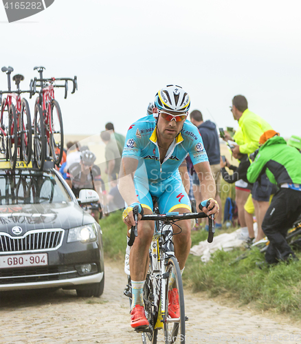 Image of Lieuwe Westra Riding on a Cobblestone Road - Tour de France 2015