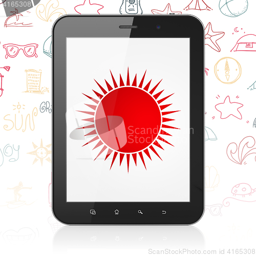 Image of Vacation concept: Tablet Computer with Sun on display