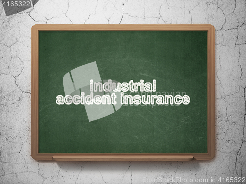 Image of Insurance concept: Industrial Accident Insurance on chalkboard background