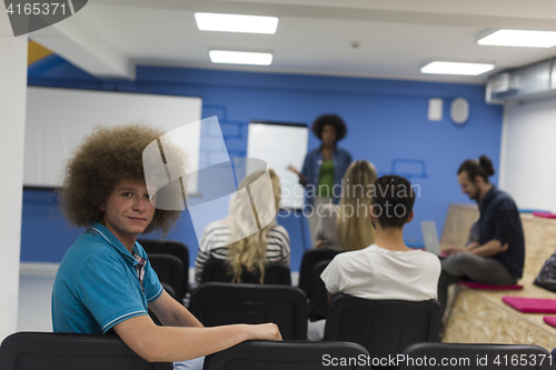 Image of Portrait of young informal businessman