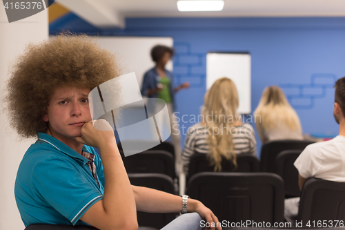 Image of Portrait of young informal businessman