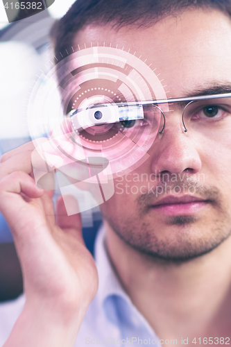 Image of Programmer with futuristic glasses