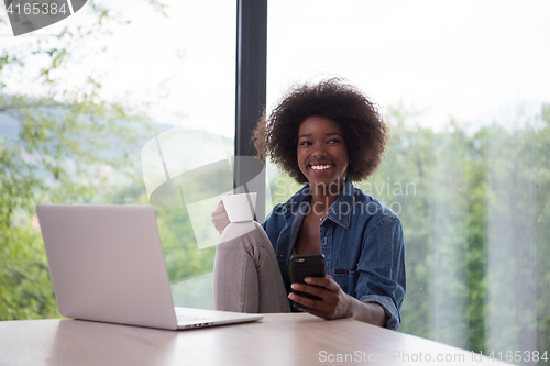 Image of African American woman in the living room