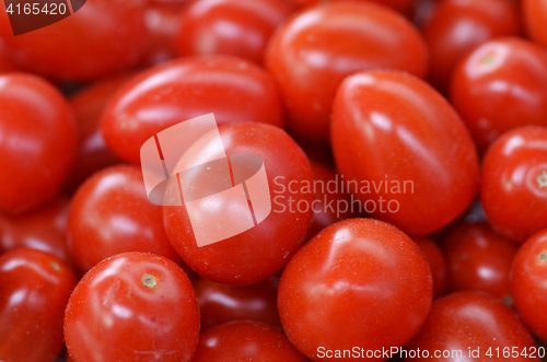 Image of Ripe fresh red tomatoes on a market