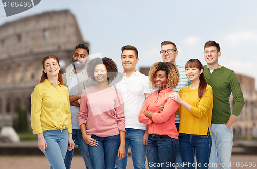 Image of international group of happy people over coliseum