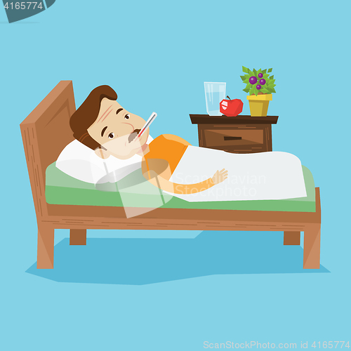 Image of Sick man with thermometer laying in bed.