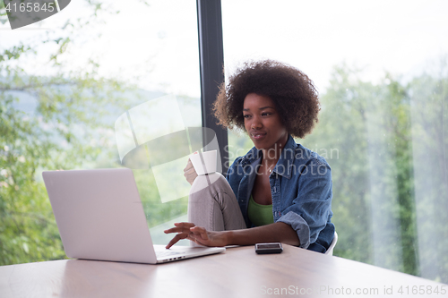 Image of African American woman in the living room