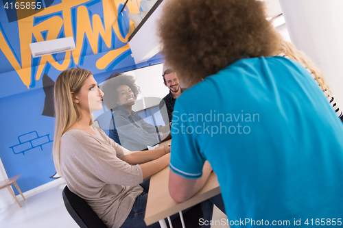 Image of Multiethnic startup business team on meeting