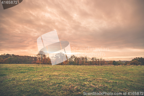 Image of Sunset scenery in a countryside landscape