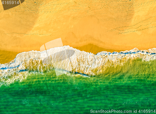 Image of Aerial View Amazing Seascape with Small Waves on Sandy Beach