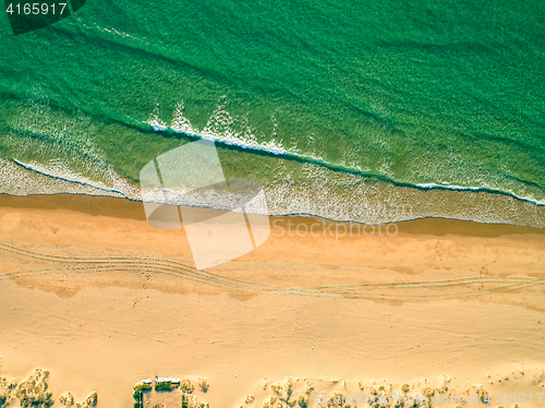 Image of Aerial View Amazing Seascape with Small Waves on Sandy Beach