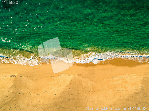 Image of Aerial View Amazing Seascape with Small Waves on Sandy Beach